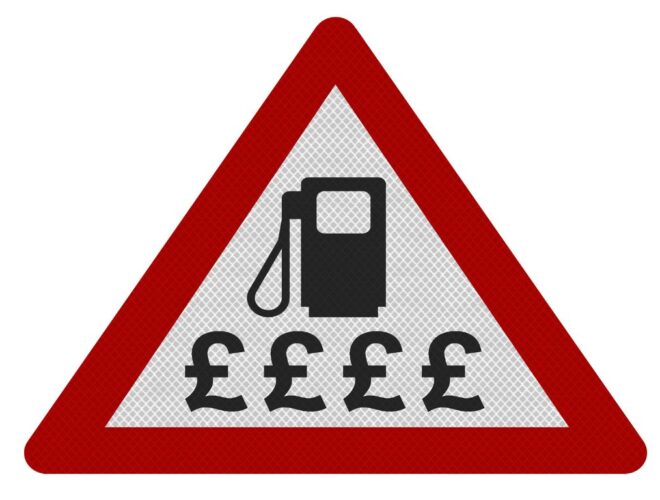 A warning sign with a fuel pump outline and pound signs beneath it