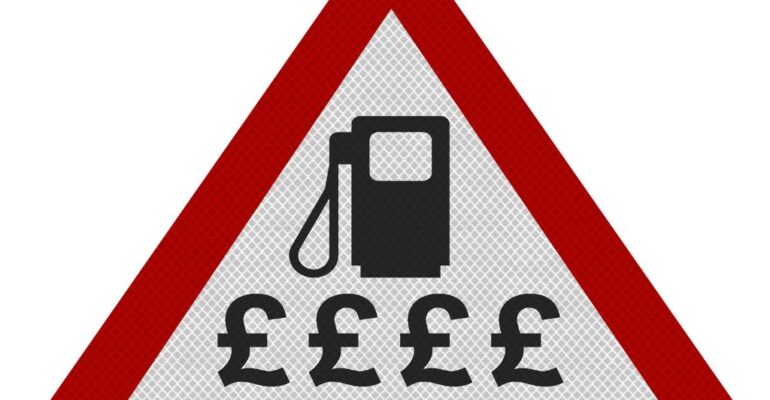A warning sign with a fuel pump outline and pound signs beneath it