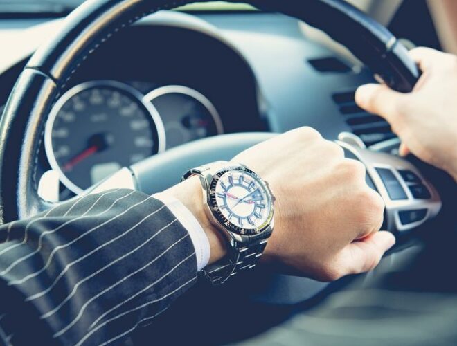 A businessman behind the wheel