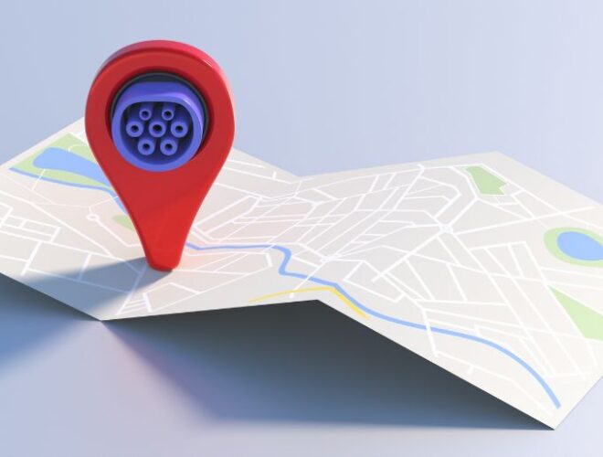 An Ev charging pin hovers over a map